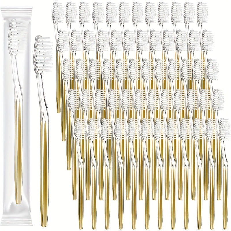 Un paquet de 50 brosses à dents jetables avec des poils mi-doux, des brosses à dents manuelles en nylon, emballées individuellement pour les voyages et les hôtels, adaptées aux soins bucco-dentaires des adultes.